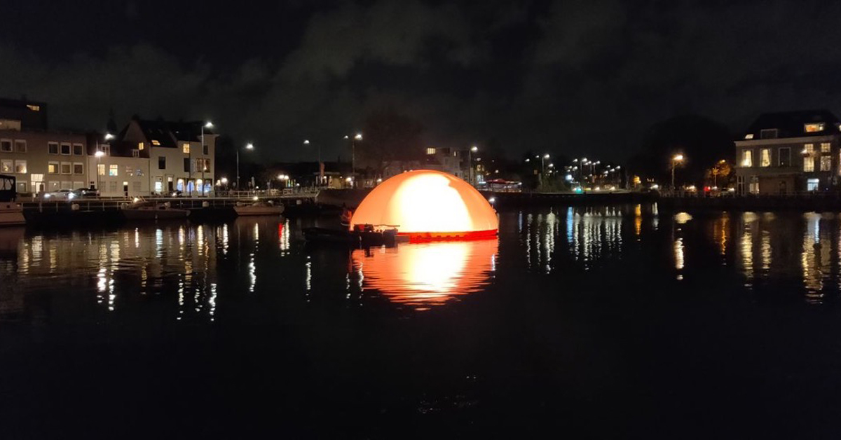 Sunset in Delft, Highlight festival 2021. Night photo of inflatable artwork